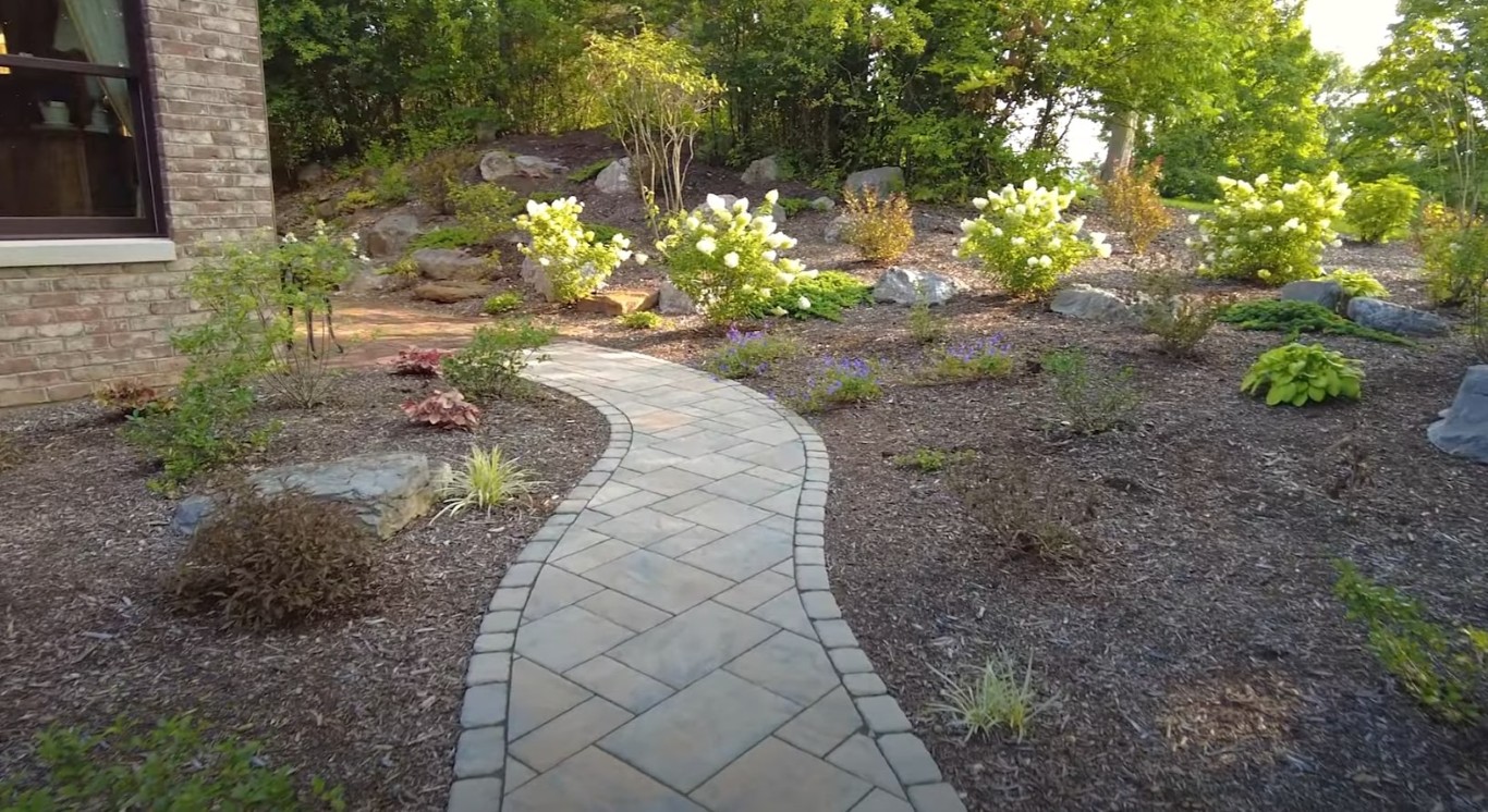 Curved paver walkway and professional landscaping in Inglewood, CA
